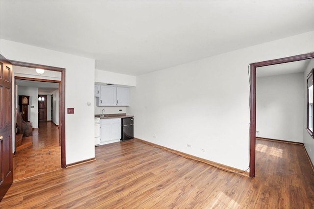 1554 Chickasaw Dr, Naperville, IL 60563 - unfurnished living room featuring a sink and wood finished floors