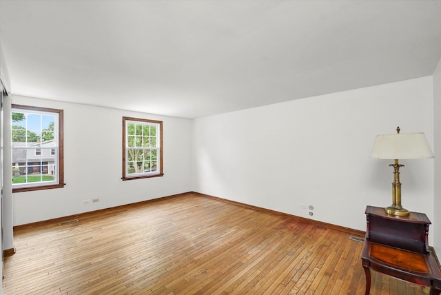 1554 Chickasaw Dr, Naperville, IL 60563 - unfurnished room with plenty of natural light and light wood-style flooring
