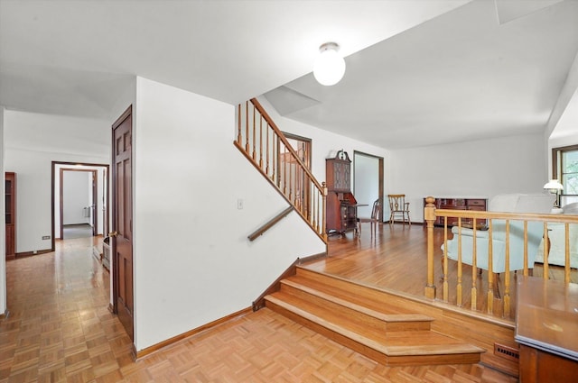 1554 Chickasaw Dr, Naperville, IL 60563 - staircase featuring baseboards