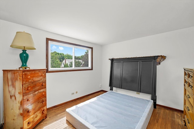1554 Chickasaw Dr, Naperville, IL 60563 - bedroom featuring light wood-style floors and baseboards