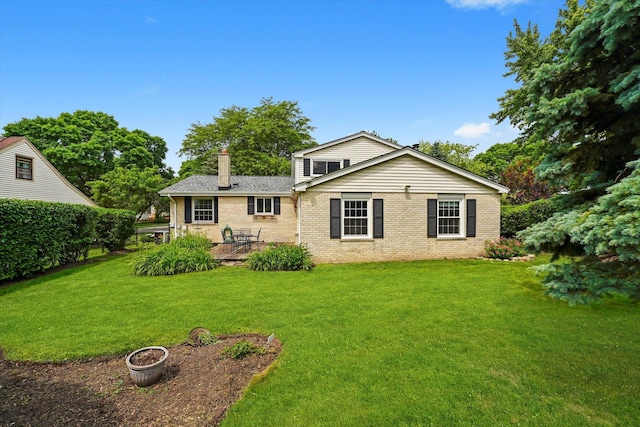 1554 Chickasaw Dr, Naperville, IL 60563 - back of property with a chimney, a lawn, brick siding, and a deck