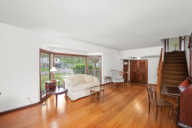 1554 Chickasaw Dr, Naperville, IL 60563 - living room with light wood-style flooring and stairs