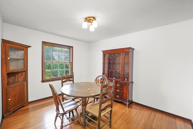 1554 Chickasaw Dr, Naperville, IL 60563 - dining space featuring light wood-type flooring and baseboards