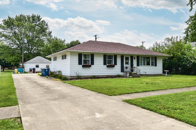 109 E Seminole St, Dwight, IL 60420 - single story home featuring a front lawn, concrete driveway, and a shingled roof