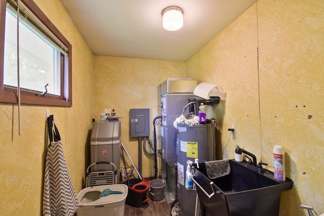 109 E Seminole St, Dwight, IL 60420 - utility room featuring water heater and electric panel
