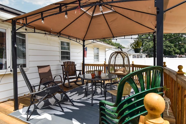 109 E Seminole St, Dwight, IL 60420 - wooden deck with a gazebo and outdoor dining space