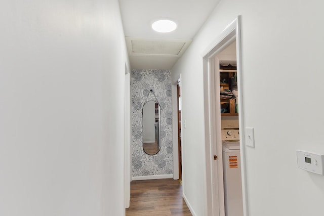 109 E Seminole St, Dwight, IL 60420 - hallway with washer / clothes dryer, wood finished floors, and wallpapered walls