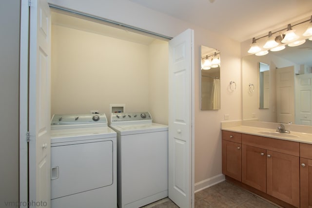 8440 Callie Ave Unit 410, Morton Grove, IL 60053 - washroom with separate washer and dryer and light tile patterned floors