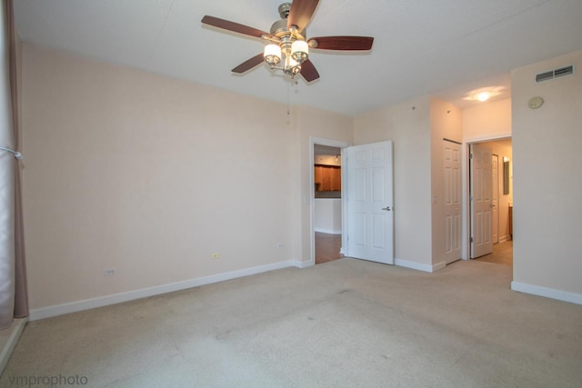 8440 Callie Ave Unit 410, Morton Grove, IL 60053 - unfurnished bedroom with carpet flooring and a ceiling fan