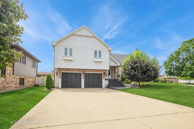 6140 Ruby St, Rosemont, IL 60018 - view of front of home featuring board and batten siding, a front yard, driveway, and an attached garage