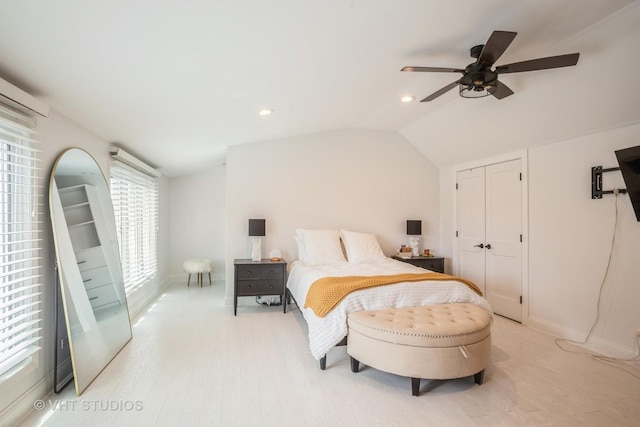 6140 Ruby St, Rosemont, IL 60018 - bedroom featuring light wood-type flooring, lofted ceiling, a ceiling fan, recessed lighting, and a closet
