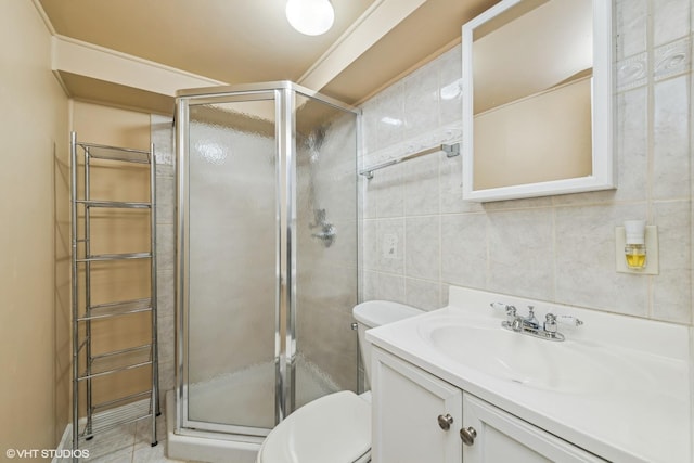 320 Pleasant St, Hoffman Estates, IL 60169 - bathroom featuring a shower stall, vanity, and tile walls