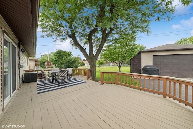 320 Pleasant St, Hoffman Estates, IL 60169 - deck with outdoor dining area, area for grilling, an outdoor structure, and a garage