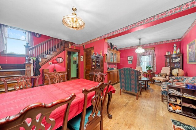 606 N Brainard Ave, La Grange Park, IL 60526 - dining space featuring a chandelier, healthy amount of natural light, and light wood-type flooring