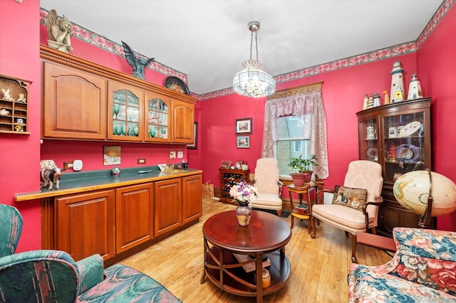 606 N Brainard Ave, La Grange Park, IL 60526 - bar featuring a chandelier, light wood-type flooring, and pendant lighting