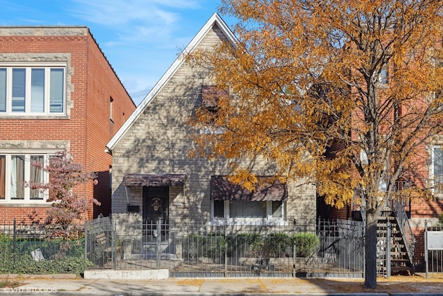 2242 W Taylor St, Chicago, IL 60612 - view of front of home featuring a fenced front yard and brick siding