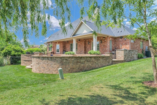 4905 Peifer Ln, Champaign, IL 61822 - view of front facade with brick siding and a shingled roof
