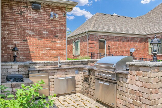 4905 Peifer Ln, Champaign, IL 61822 - view of patio / terrace with a sink and area for grilling