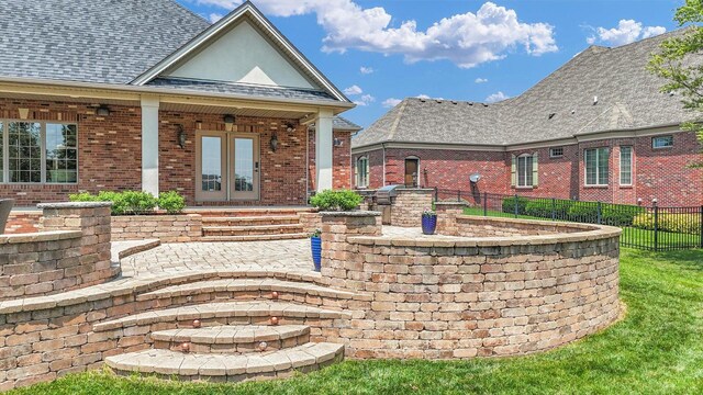 4905 Peifer Ln, Champaign, IL 61822 - view of patio with an outdoor kitchen and french doors