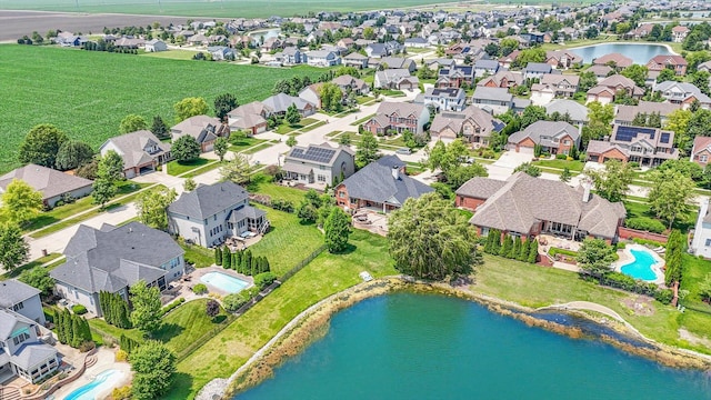 4905 Peifer Ln, Champaign, IL 61822 - aerial perspective of suburban area with a large body of water and a pool