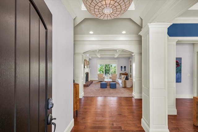 4905 Peifer Ln, Champaign, IL 61822 - entrance foyer with arched walkways, dark wood-type flooring, ornamental molding, decorative columns, and coffered ceiling