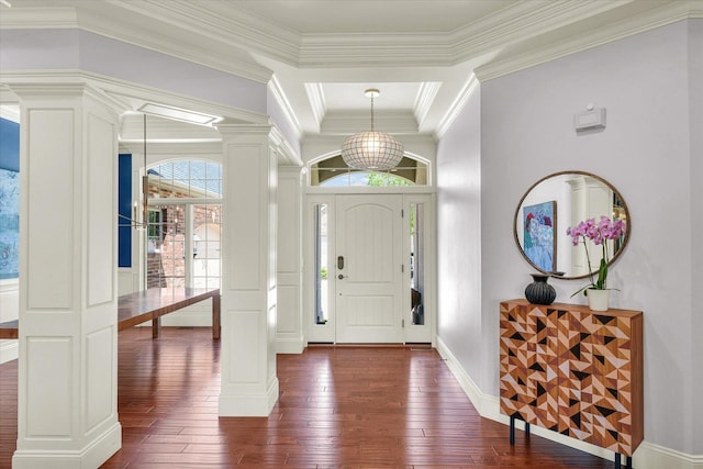 4905 Peifer Ln, Champaign, IL 61822 - foyer featuring ornate columns, dark wood finished floors, plenty of natural light, and ornamental molding