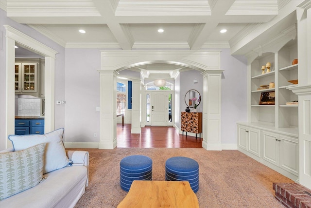 4905 Peifer Ln, Champaign, IL 61822 - living area featuring arched walkways, light carpet, coffered ceiling, ornamental molding, and beam ceiling