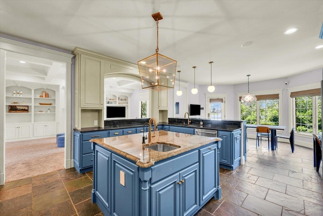 4905 Peifer Ln, Champaign, IL 61822 - kitchen with blue cabinetry, an island with sink, stone tile floors, dishwasher, and recessed lighting