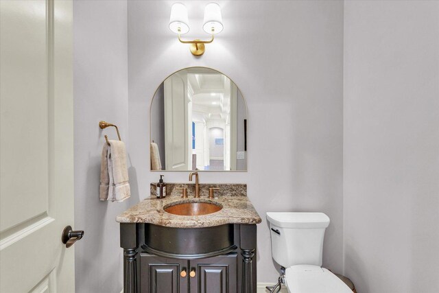 4905 Peifer Ln, Champaign, IL 61822 - full bath featuring ornate columns, vanity, a tub with jets, tile patterned flooring, and ornamental molding