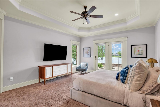 4905 Peifer Ln, Champaign, IL 61822 - bedroom featuring a raised ceiling, access to outside, crown molding, carpet floors, and ceiling fan
