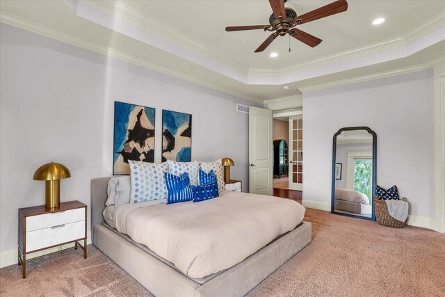4905 Peifer Ln, Champaign, IL 61822 - carpeted bedroom with ornamental molding, arched walkways, a tray ceiling, recessed lighting, and a ceiling fan