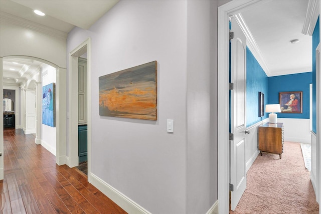 4905 Peifer Ln, Champaign, IL 61822 - hallway featuring arched walkways, crown molding, dark wood-style floors, and recessed lighting