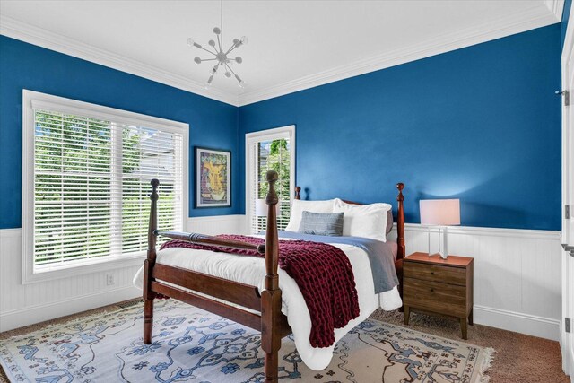 4905 Peifer Ln, Champaign, IL 61822 - carpeted bedroom featuring wainscoting, multiple windows, and crown molding