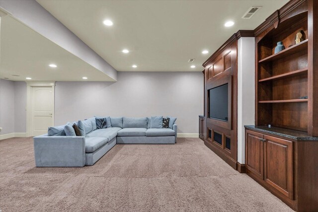 4905 Peifer Ln, Champaign, IL 61822 - cinema room with crown molding, a decorative wall, carpet, wood walls, and recessed lighting