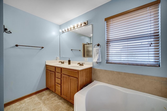 8304 Trumbull Ave, Joliet, IL 60431 - full bathroom featuring a bath and double vanity