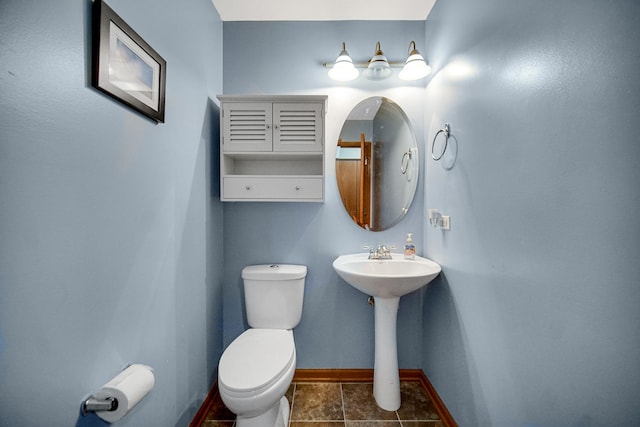 8304 Trumbull Ave, Joliet, IL 60431 - bathroom featuring toilet and tile patterned floors