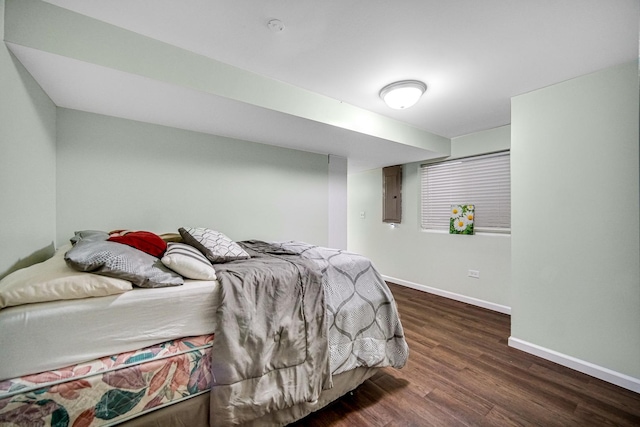 8304 Trumbull Ave, Joliet, IL 60431 - bedroom with wood finished floors and electric panel