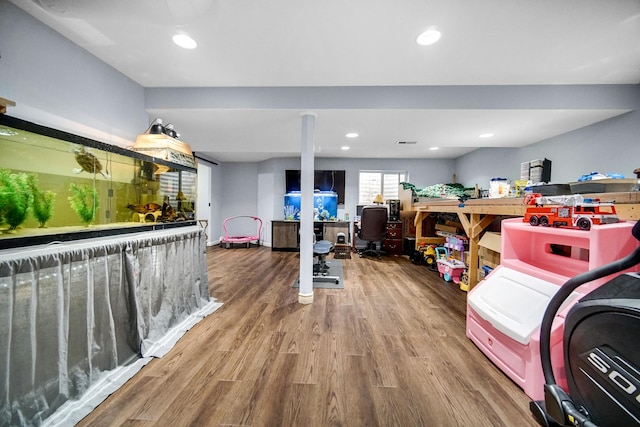 8304 Trumbull Ave, Joliet, IL 60431 - interior space with wood finished floors and recessed lighting