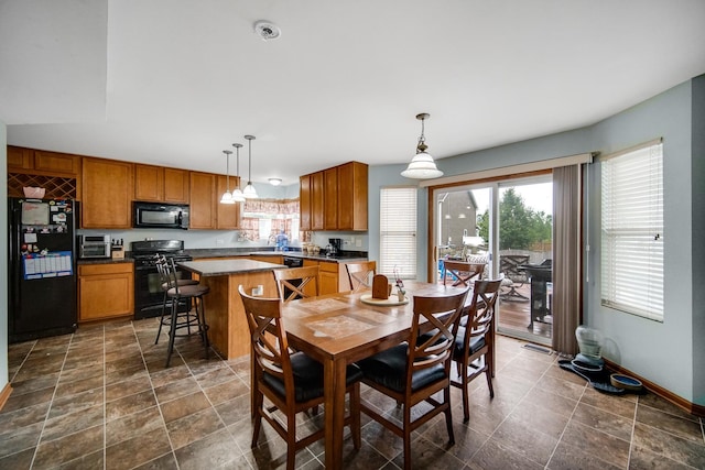 8304 Trumbull Ave, Joliet, IL 60431 - dining room with baseboards