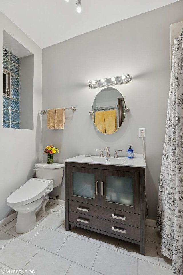 4503 N Ashland Ave Unit 2N, Chicago, IL 60640 - bathroom with vanity and tile patterned floors