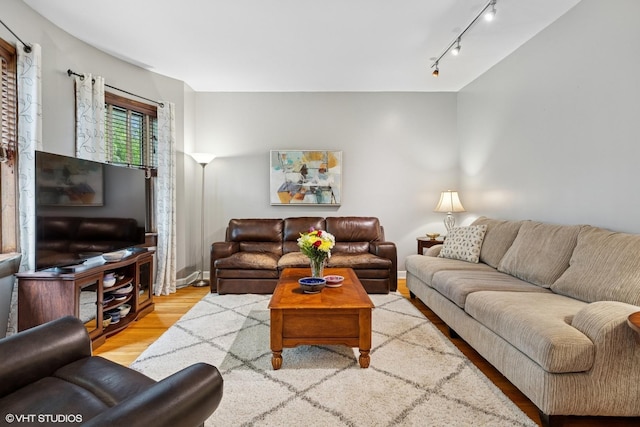 4503 N Ashland Ave Unit 2N, Chicago, IL 60640 - living room featuring track lighting and light wood-style flooring
