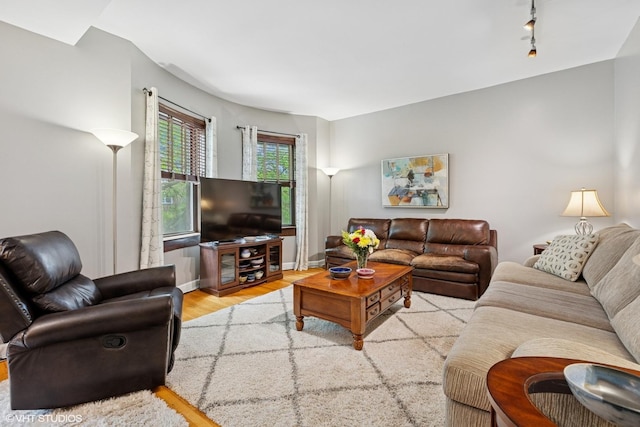 4503 N Ashland Ave Unit 2N, Chicago, IL 60640 - living room featuring wood finished floors and track lighting