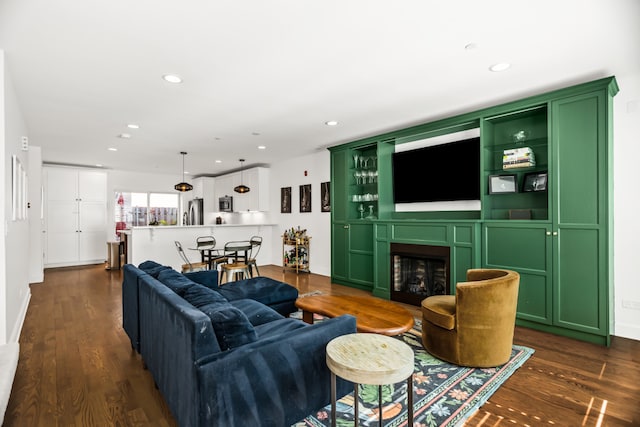 643 Custer Ave, Evanston, IL 60202 - living room with a fireplace, dark wood-type flooring, and recessed lighting