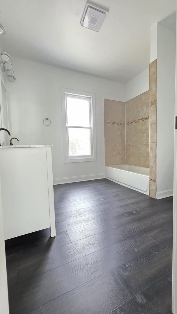 208 N Chestnut St, Aurora, IL 60506 - bathroom with vanity and hardwood / wood-style flooring