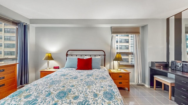 5050 S E End Ave Unit 9C, Chicago, IL 60615 - bedroom with tile patterned floors and baseboards