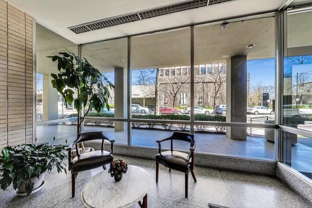 5050 S E End Ave Unit 9C, Chicago, IL 60615 - common area featuring floor to ceiling windows