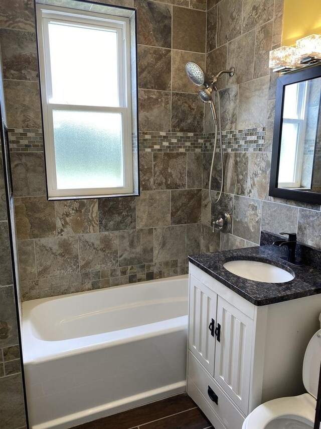 1826 S Drake Ave, Chicago, IL 60623 - bathroom with  shower combination, vanity, and wood finished floors