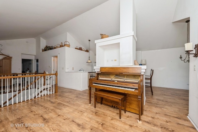 601 Cary Woods Cir Unit 601, Cary, IL 60013 - living area featuring lofted ceiling, an upstairs landing, and light wood-style floors