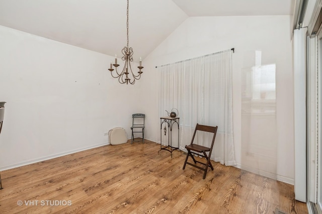 601 Cary Woods Cir Unit 601, Cary, IL 60013 - sitting room with lofted ceiling, a chandelier, and wood finished floors
