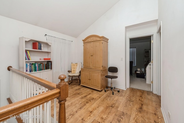 601 Cary Woods Cir Unit 601, Cary, IL 60013 - hall with vaulted ceiling, light wood-style floors, and an upstairs landing